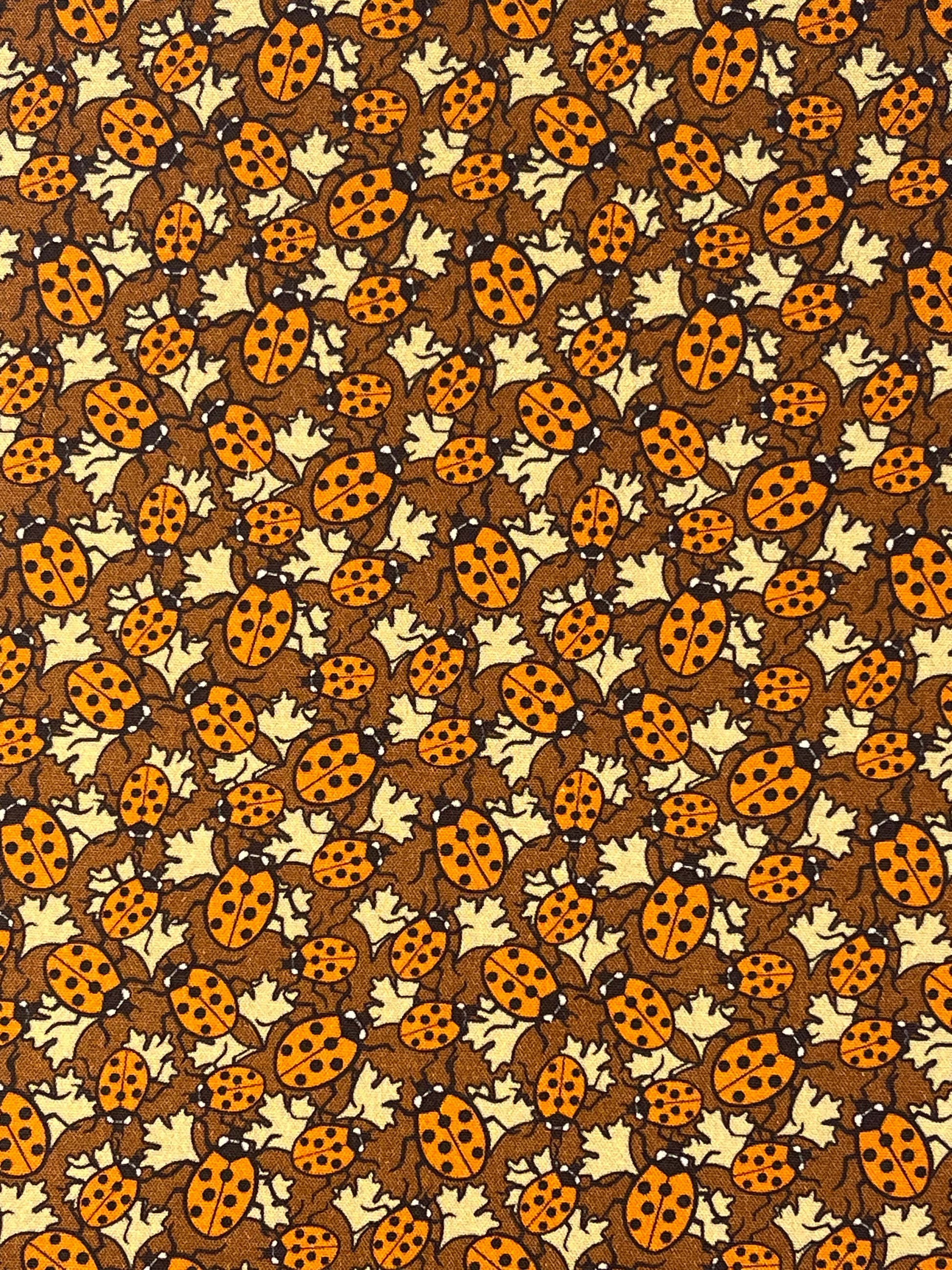 Ladybirds on leaves fabric