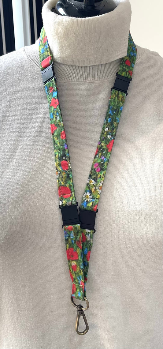 Floral patterned lanyard on a mannequin with a white sweater