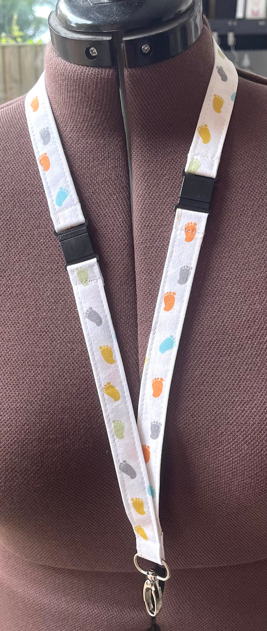 Foot Print Multi Color Fabric Breakaway Lanyard image 0