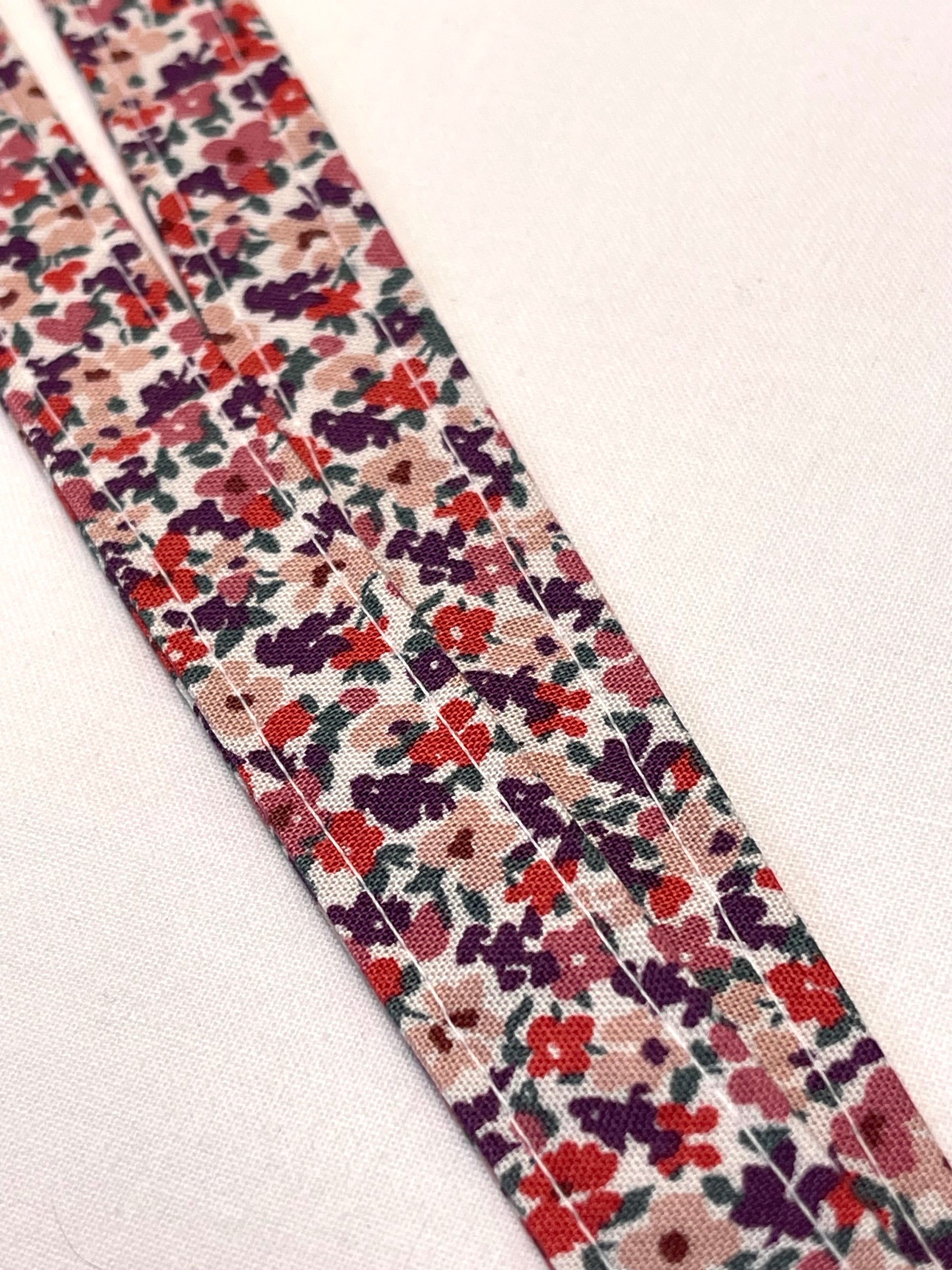 Floral patterned ribbon on a white background