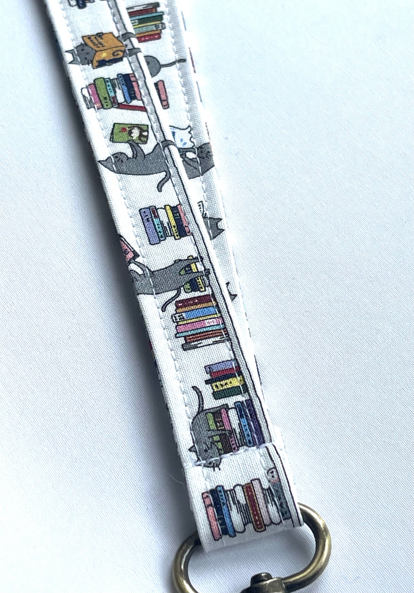 Cats on bookshelves White fabric Breakaway Lanyard - House of Lanyards