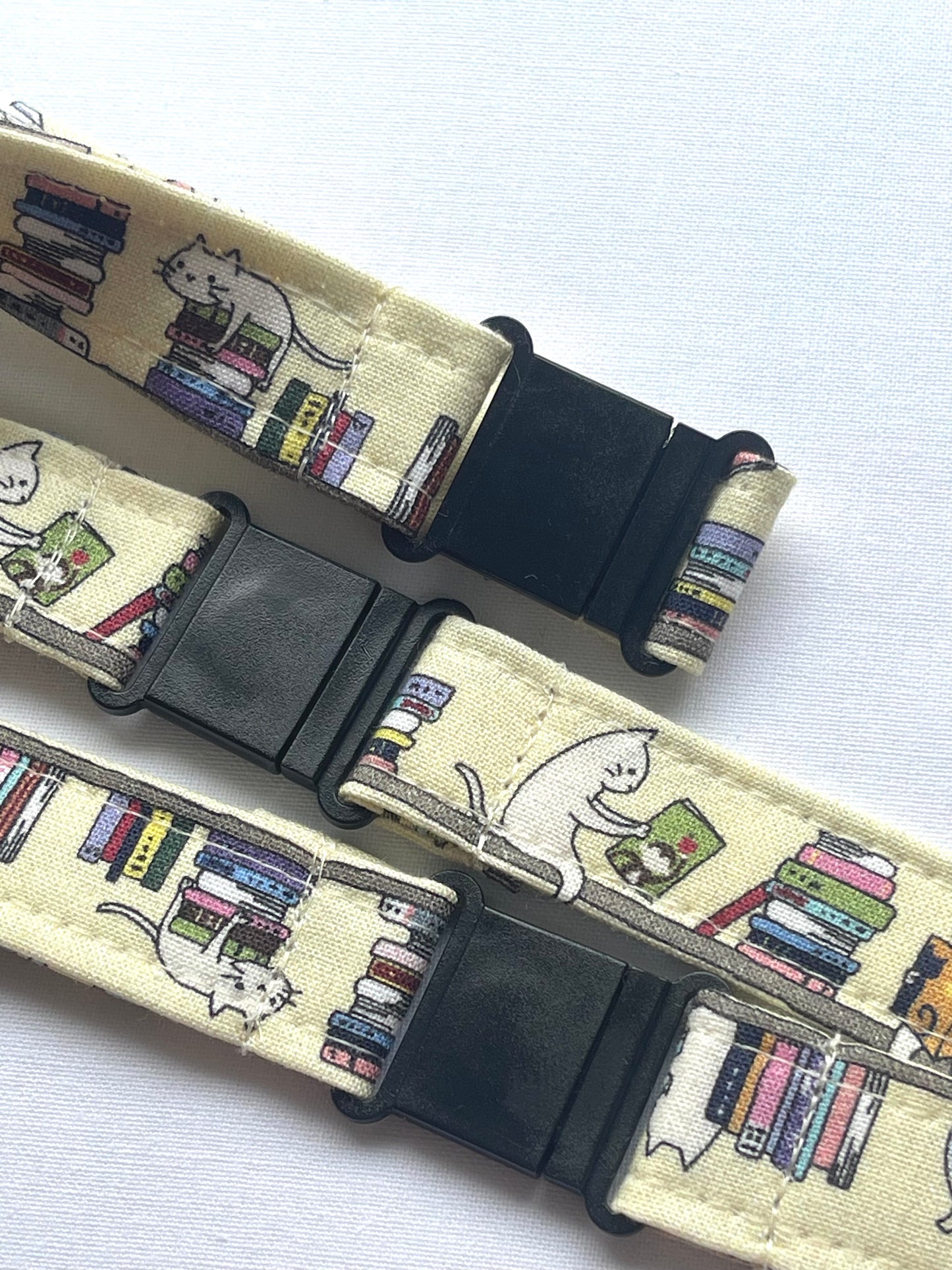 Cats on bookshelves Yellow fabric Breakaway Lanyard - House of Lanyards