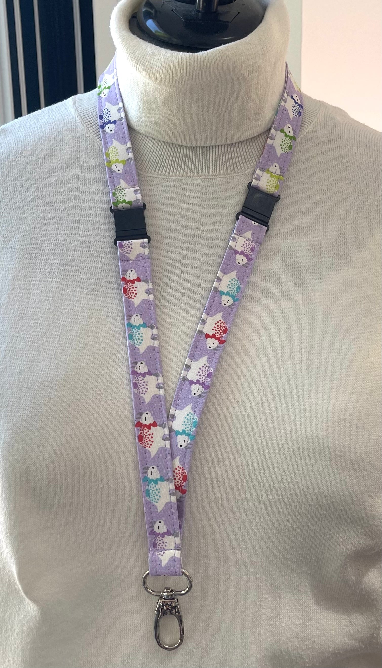 Lanyard with dinosaur character design on a mannequin