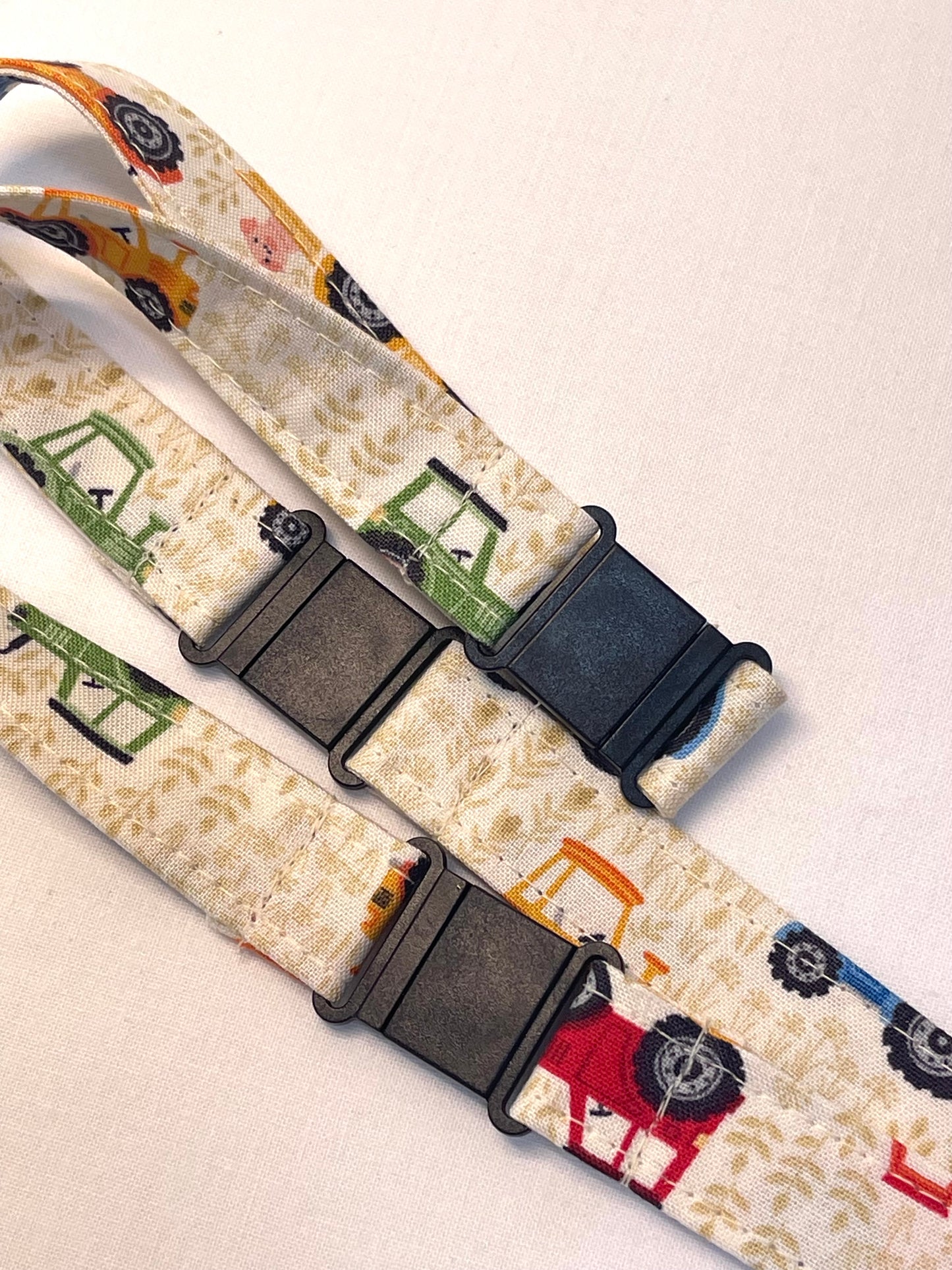 Lanyard with colorful truck pattern on a light background