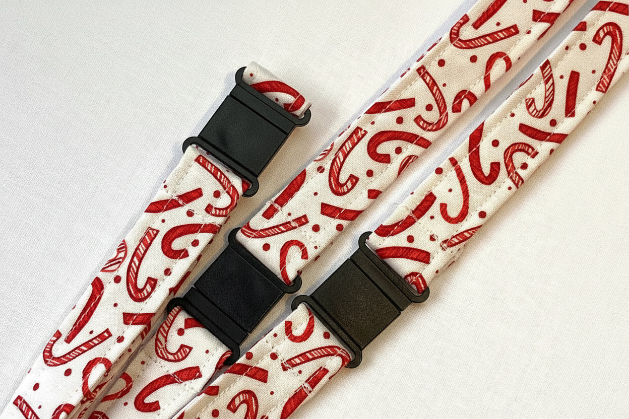 Handmade safety breakaway lanyard with multiple anti-strangulation breakaway points, designed for NHS, healthcare, mental health and security professionals. Close-up of plastic breakaway safety clip designed to release under pressure to reduce strangulation risk. 
