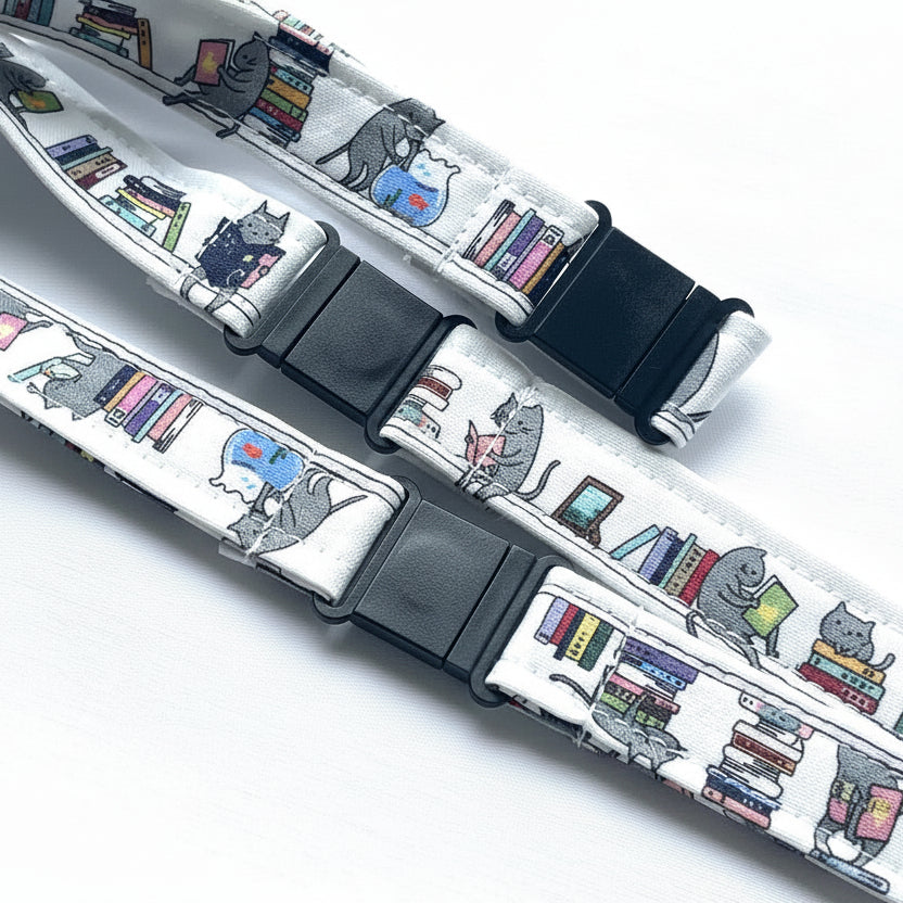 Handmade safety breakaway lanyard with multiple anti-strangulation breakaway points, designed for NHS, healthcare, mental health and security professionals. Close-up of plastic breakaway safety clip designed to release under pressure to reduce strangulation risk. 