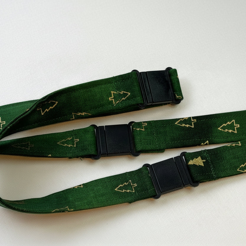 Handmade safety breakaway lanyard with multiple anti-strangulation breakaway points, designed for NHS, healthcare, mental health and security professionals. Close-up of plastic breakaway safety clip designed to release under pressure to reduce strangulation risk. 